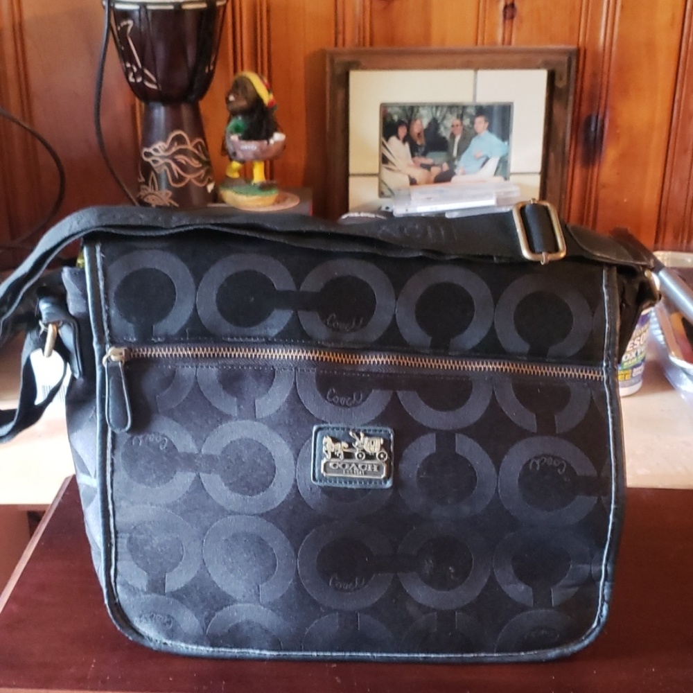 Coach black midsize messenger bag.